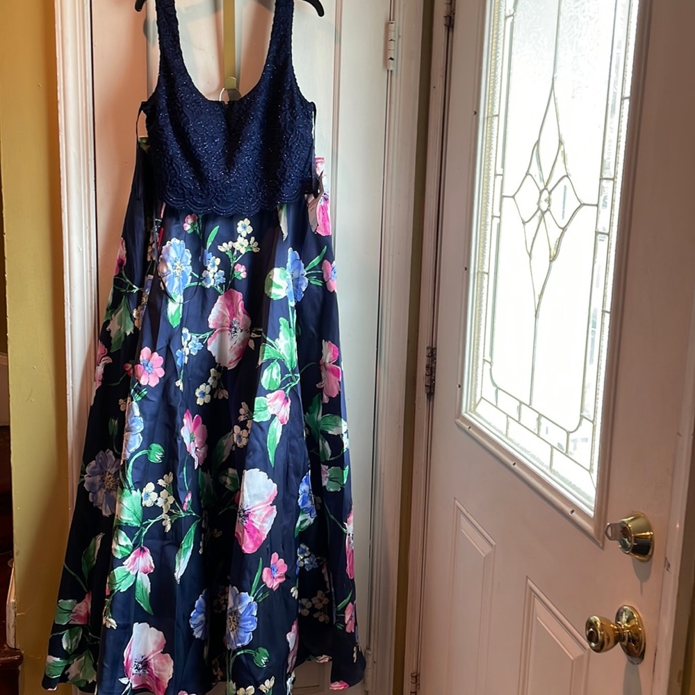 Two piece set with floral print. Never worn. With tags size 13 juniors